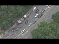 Crews put out fire in homeless camp near I-85