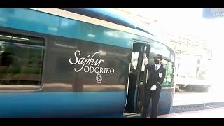 サフィール踊り子メガネ美人車掌つき　The beautiful conductor, in front of the SAPHIR ODRIKO.