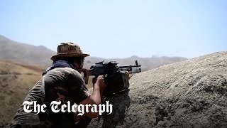 Armed fighters battle the Taliban in Afghanistan's Panjshir valley