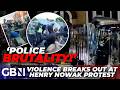 Henry Nowak murder protest erupts as riot police PELTED with bottles and flaming wheelie bins