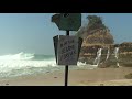 seconds of waves sweeping the coast of the southern coast of java