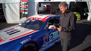 Glenn Seton's guided to tour around a Trans Am race car