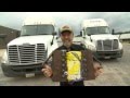 Tearing two interlaced phone books apart using two 18 wheeler trucks