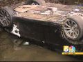 Driver sent to hospital after flipping car into creek