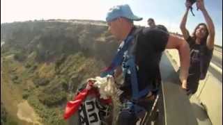 Johnny Strange Base jump front flip over unpacked parachute