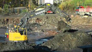 Volvo ECR235CL Digging Gravel And Mud