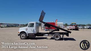 490 • 1999 International 4700 • With 18' Flatbed and Hoist