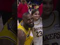 lebron with a young fan after the game