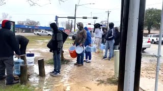Texans Line Up at Pipes for Clean Water