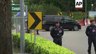 Convoy believed to be carrying NKorean leader departs from Singapore airport