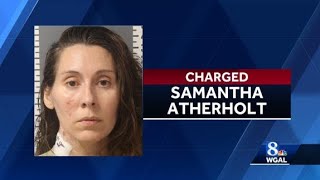 Woman shot during standoff now charged with attempted murder