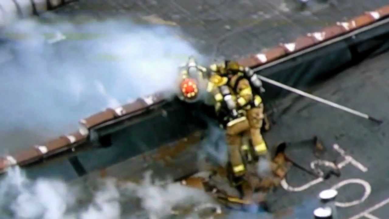 Firefighters Narrowly Escape Roof Collapse In Michigan 3/30/2012 - YouTube