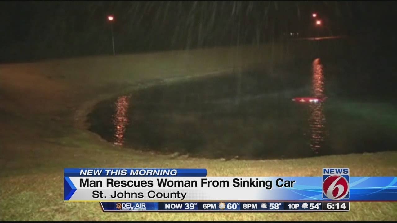 Man Rescues Woman From Sinking Car - YouTube