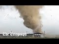 Tornado rips through apartment blocks in Indiana