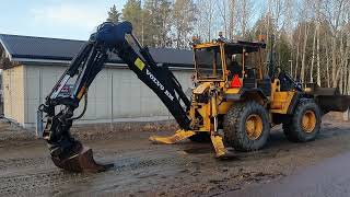 Traktorgrävare Volvo BM 6300 med tiltrotator och redskap