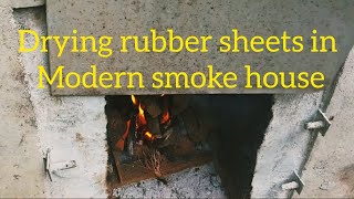 Drying rubber sheets in modern smoke house