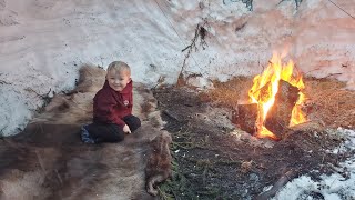 Winter Camping in Bushcraft Shelter with Animal Hides for a Bed (in Deep Snow)