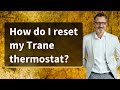 How do I reset my Trane thermostat?