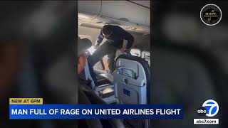 Passengers on United flight restrain unruly man after violent outburst on flight to LAX