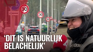 Zeer lange rij verkeersborden aan de Pieter Calandlaan