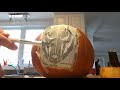 carving a pumpkin with stencil