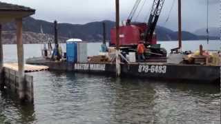 Burton Marine Pile Driving moving their dock building barge into position.