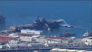 Battle to save burning US Navy warship ongoing