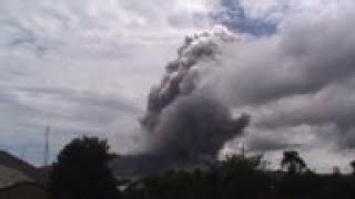 Self cover as villagers flee from volcano area