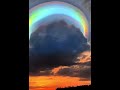 Удивительное явление природы Круглая полная радуга.rainbow scarf cloud over haikou city in china