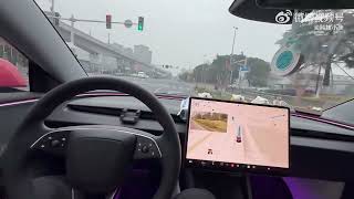 Updated Autopilot on the road in China (some call it FSD)