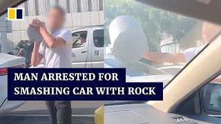 Chinese man arrested for smashing car windscreen