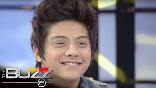 The Buzz Uncut : Daniel gives Kathryn a electric bass