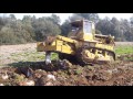 Caterpillar D8H ripping/pulling rocks