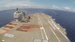 USS Saratoga begins her final voyage with one last fixed wing carrier take off / landing.