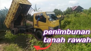 proses penimbunan tanah rawa