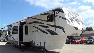 Pre~Owned RV Gem 2014 Keystone Raptor 4014