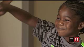 9 Family Connection and Jamie Holmes deliver books to Central Florida Schools