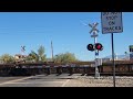 up 8101 automodal train with ex sp unit and sd70m joiner road railroad crossing marana az