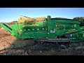 screening topsoil with a trommel