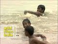 Kids splashing around in the waters of Yamuna River, Delhi