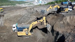 Caterpillar 385C And Caterpillar 352F Excavators Loading Trucks - Aerial Video - Ascon Ltd