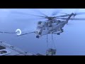 ch 53e helicopter perform air refueling while carrying a humvee