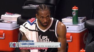Kawhi Leonard is smiling, folks, believe me. He just hasn't told his face yet.