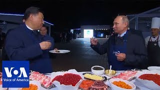 Putin and Xi make pancakes | VOANews