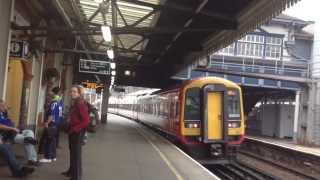 South West Trains 159010 and 159101 depart Clapham Junction