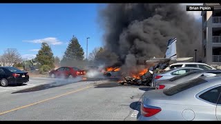 Five hurt after plane crashes into parking lot