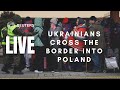 LIVE: Ukrainians cross over the border into Poland