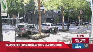 Multiple shots fired, reports of armed person near Midtown Four Seasons hotel | What we know