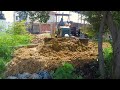 start to finish project dozer d20 u0026 5t truck pushing stone into dirty water