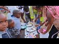 CUTTING CAKE AT CHARITY AMBASSADOR IN KENYA AT SIDON CHILDREN HOME